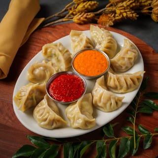 Steam Chicken Momo(scm)