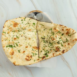 35. Garlic Naan(gn)